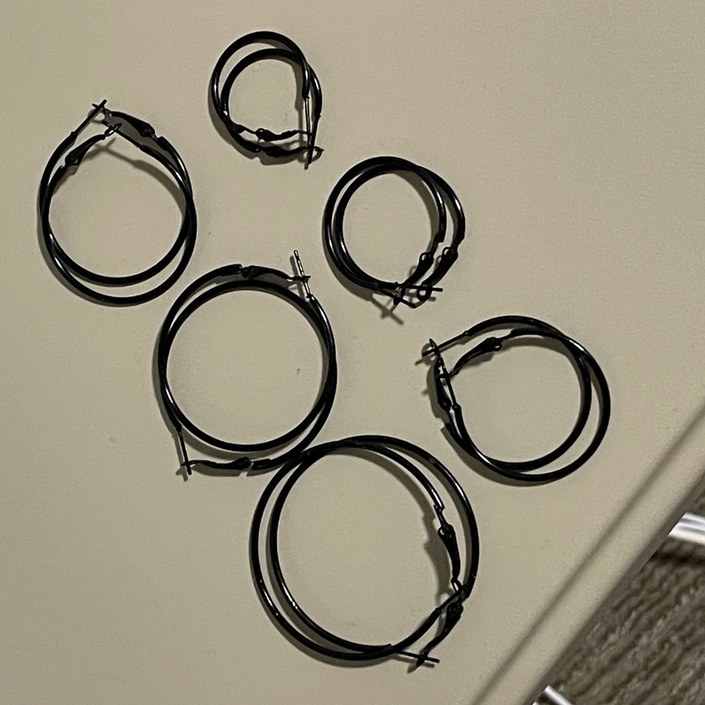 Six pairs multiple sizes Black hoop earrings